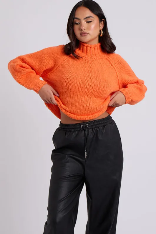 Orange Exposed Seam Roll Neck Jumper