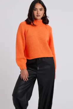 Orange Exposed Seam Roll Neck Jumper